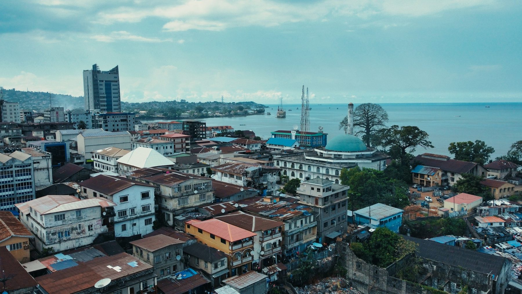Rooftops of Freetown, Sierra Leone, running down to the bay